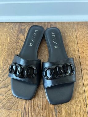 Unisa Black Slide Mules with Glossy Chain Accent